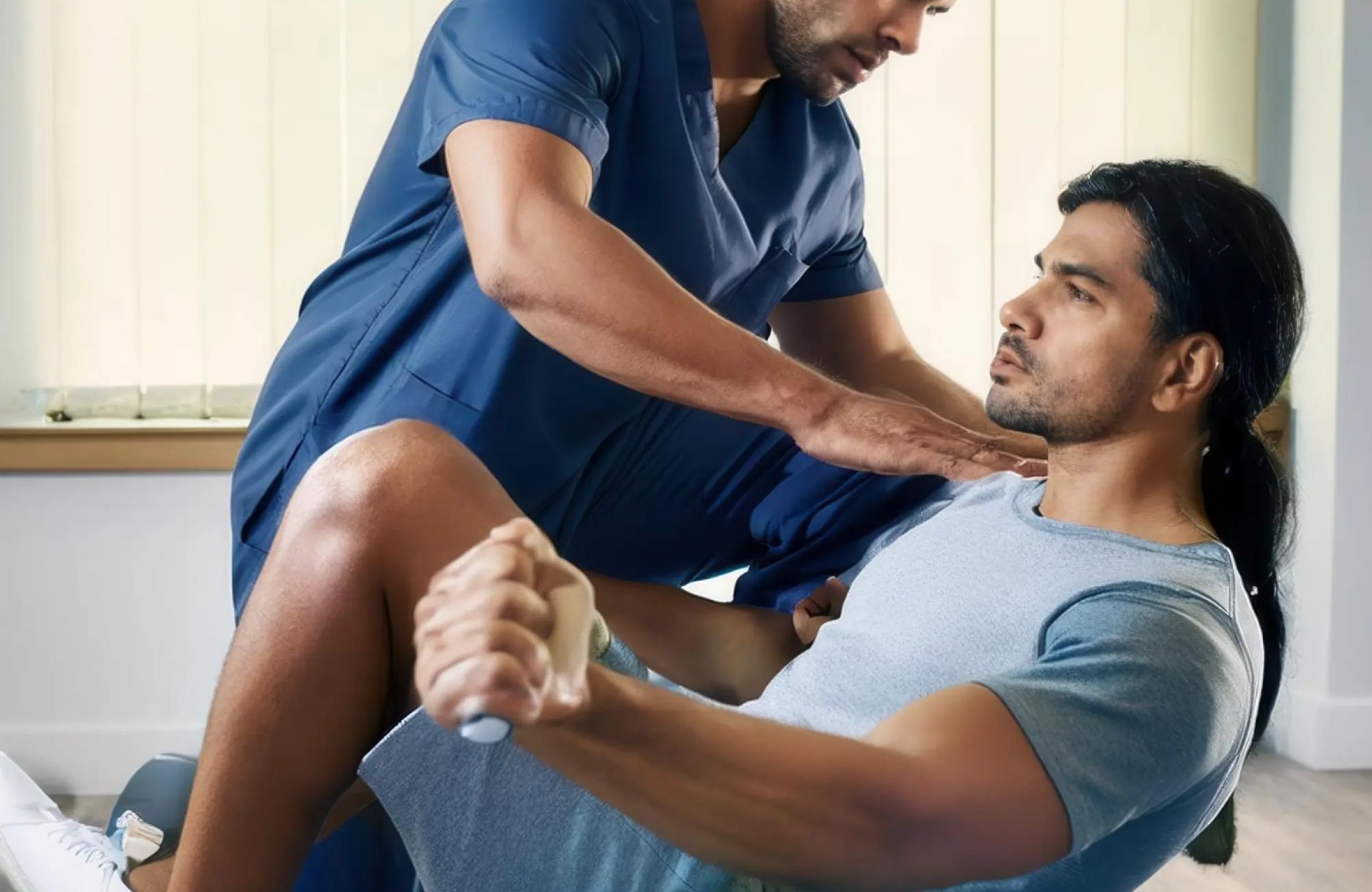 Specialist physiotherapist assisting with mobility recovery